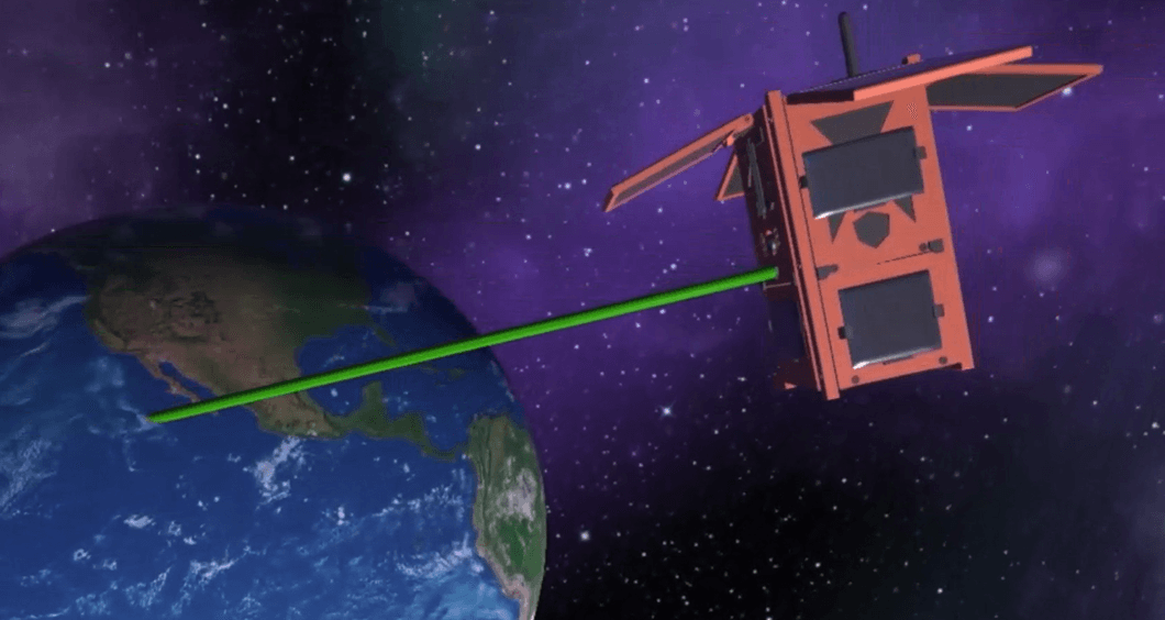 A laser-equipped satellite firing a green beam toward Earth